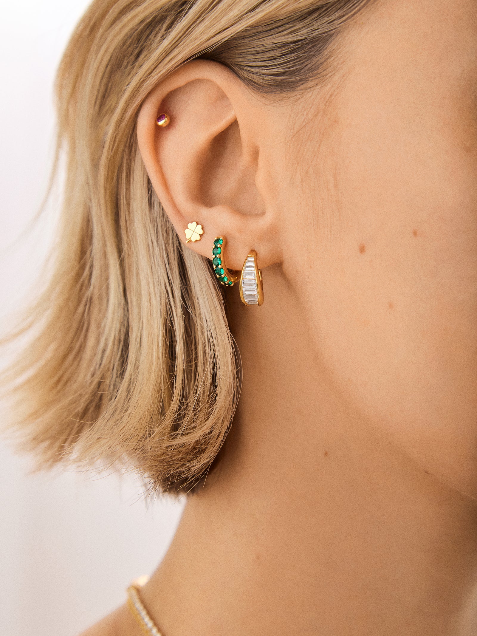 18K Gold Birthstone Huggie Earrings - Emerald - Image 2